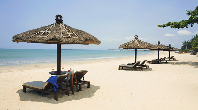 belmond jimbaran puri beach loungers